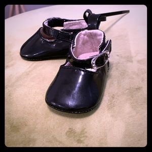 Baby Mary Janes. High shine black.
